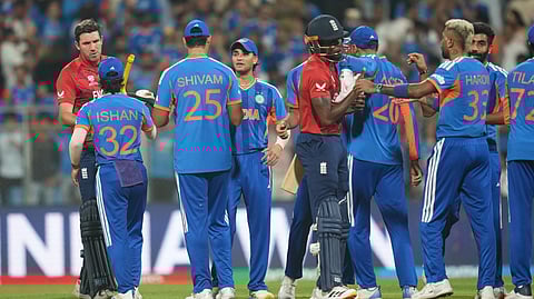 Players greet each other at the end of the T20 World Cup cricket semi-final match between India and England in Mumbai, India, Thursday, March 5, 2026.