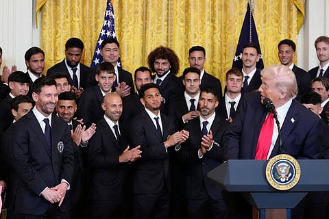 President Donald Trump looks at Lionel Messi during an event to honor the 2025 Major League Soccer champions Inter Miami CF in the East Room of the White House  in Washington.