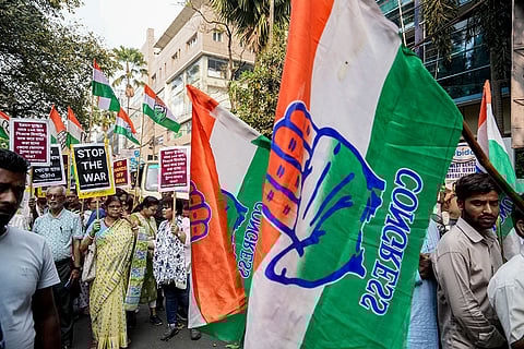 Congress supporters stage a protest against the U.S. and Israeli strikes on Iran, near the American Center in Kolkata.