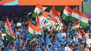| Photo: PTI/Ravi Choudhary : Fans cheer in the stands during the ICC Men's T20 World Cup 2026 second semifinal cricket match between India and England, at the Wankhede Stadium, in Mumbai, Maharashtra.
