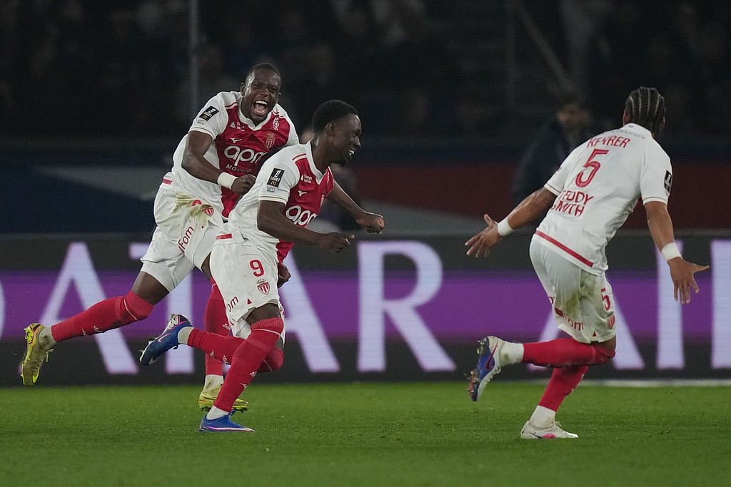 Monaco's Folarin Balogun (9) celebrates scoring his side's 3rd goal during the French League One soccer match between Paris Saint-Germain and Monaco in Paris. - | Photo: AP/Thibault Camus