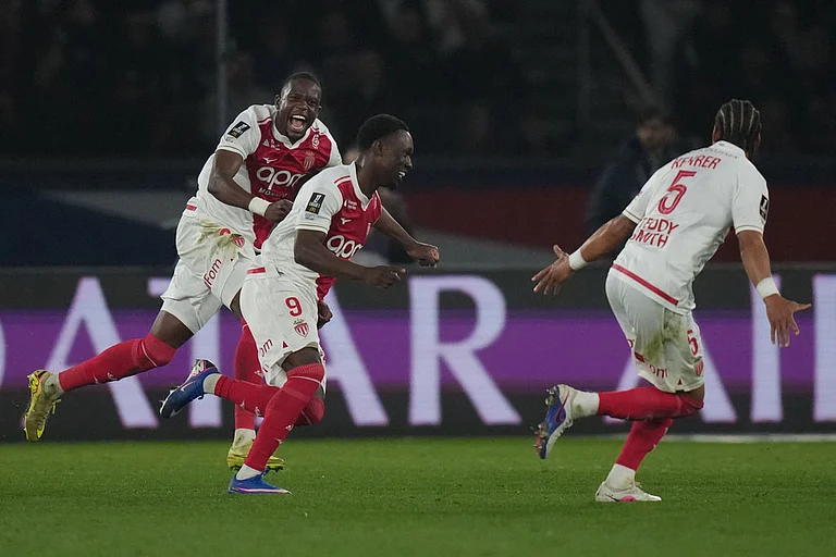 Monaco's Folarin Balogun (9) celebrates scoring his side's 3rd goal during the French League One soccer match between Paris Saint-Germain and Monaco in Paris. - | Photo: AP/Thibault Camus