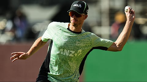 New Zealand's captain Mitchell Santner throws a ball during a practice session ahead of the T20 World Cup cricket final match against India in Ahmedabad, India, Saturday, March 7, 2026.