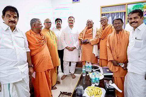 In this image received on March 7, 2026, Leader of Opposition in the Lok Sabha Rahul Gandhi, centre, with Congress MP KC Venugopal, left, and others, at Sivagiri Mutt, in Kollam, Kerala.