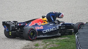 | Photo: AP/Asanka Brendon Ratnayake : Red Bull driver Max Verstappen of the Netherlands gets out of his car after a crash during the qualifying session for the Australian Formula One Grand Prix at Albert Park, in Melbourne, Australia, Saturday, March 7, 2026.