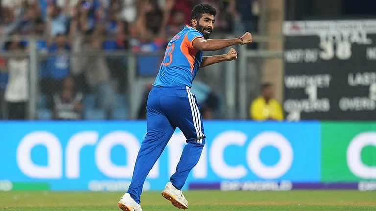 India's Jasprit Bumrah celebrates the dismissal of England's captain Harry Brook during the T20 World Cup cricket semi-final match between India and England in Mumbai, India. - | Photo: AP/Rafiq Maqbool