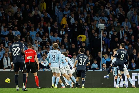 Real Madrid's Federico Valverde scores his side's second goal during a Spanish La Liga soccer match between Celta Vigo and Real Madrid in Vigo, Spain.