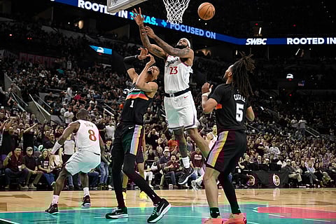 Los Angeles Clippers forward Isaiah Jackson (23) tangles with San Antonio Spurs center Victor Wembanyama (1) during the second half of an NBA basketball game in San Antonio.