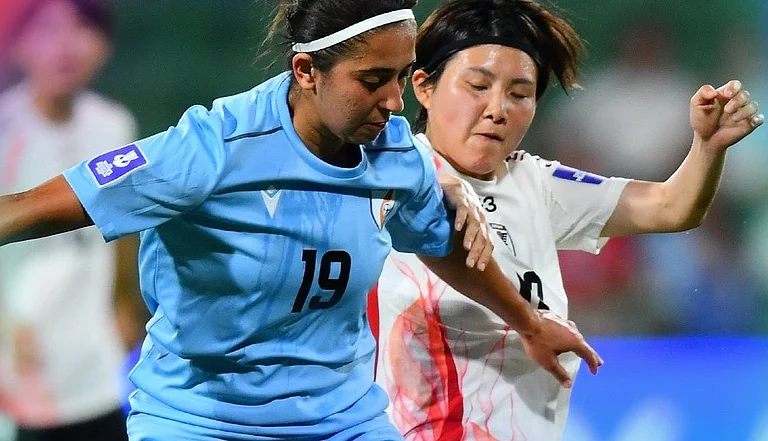 Indian footballers competing with the Japan footballers for the ball during India vs Japan AFC Women's Asian Cup 2026 match. - afcasiancup/X