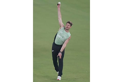 New Zealand's Lockie Ferguson attends a training session ahead of the T20 World Cup cricket final match against India in Ahmedabad, India.