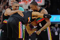 | Photo: AP/Darren Abate : San Antonio Spurs players Victor Wembanyama, center, De'Aaron Fox (4) and Keldon Johnson celebrate their win after an NBA basketball game against the Los Angeles Clippers in San Antonio.