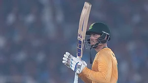 | Photo: AP/Ajit Solanki : South Africa's Quinton de Kock celebrates after scoring fifty runs during the fifth T20 cricket match between India and South Africa in Ahmedabad.