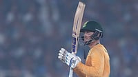 | Photo: AP/Ajit Solanki : South Africa's Quinton de Kock celebrates after scoring fifty runs during the fifth T20 cricket match between India and South Africa in Ahmedabad.