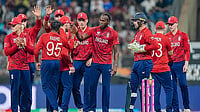 PTI : England's Adil Rashid celebrates with teammates the wicket of West Indies' Roston Chase during ICC T20 World Cup 2026 at the Wankhede Stadium.