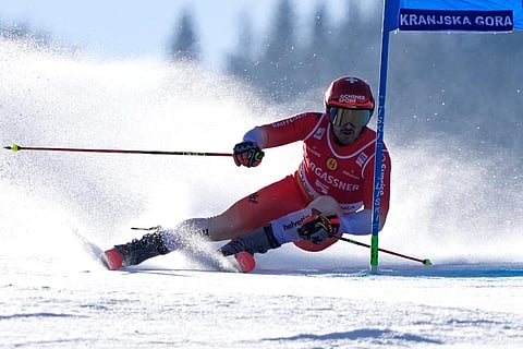 Switzerland's Loic Meillard competes during an alpine ski, men's World Cup giant slalom, in Kranjska Gora, Slovenia.