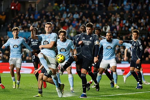 Celta Vigo and Real Madrid players play during a Spanish La Liga soccer match between Celta Vigo and Real Madrid in Vigo, Spain.