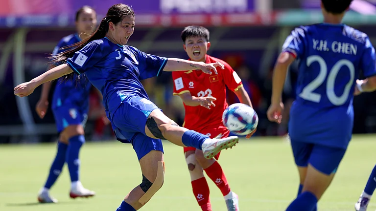 Taiwan's Su Sin-yun clears the ball during the Women's Asian Cup soccer match between Taiwan and Vietnam in Perth, Australia, Saturday, March 7, 2026. - | Photo: AP/Colin Murty
