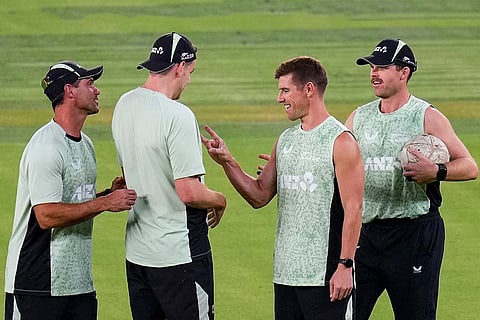 New Zealand's Cole McConchie, second right, Lockie Ferguson, right, Jacob Duffy, second left, and others during a practice session ahead of the ICC Men's T20 World Cup 2026 final cricket match between India and New Zealand, at the Narendra Modi Stadium, in Ahmedabad, Gujarat.