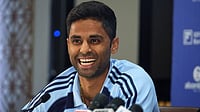 Suryakumar Yadav Responds To Mitchell Santner; Shuts Down ‘Silence The Crowd’ Narrative Ahead Of T20 World Cup Final | Photo: AP/Rafiq Maqbool : Indian Mens T20 Captain Suryakumar Yadav smiles during a press conference for India's squad announcement for the ICC Men's T20 World Cup 2026 at BCCI headquarter in Mumbai.