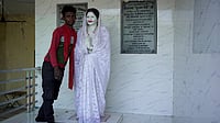 | Photo:  Animikh Chakrabarty/Outlook : Anmol, a local villager takes us to the house of Phoolan Devi in Shekhpur Guda. As he unveils the Statue from its “ghoongat”, he stops to pose with it for the camera