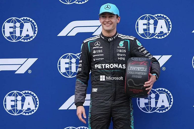 Mercedes driver George Russell of Britain reacts after winning the qualifying session for the Australian Formula One Grand Prix at Albert Park, in Melbourne, Australia. - | Photo: AP/Asanka Brendon Ratnayake