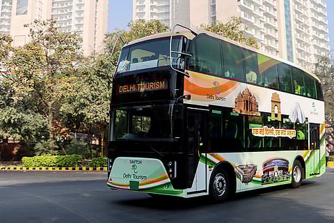 Passengers aboard a double-decker bus during a tour of key landmarks in the capital, launched as part of an initiative by the Delhi Government to boost tourism, in New Delhi.