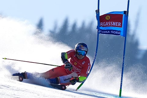 Switzerland's Marco Odermatt competes during an alpine ski, men's World Cup giant slalom, in Kranjska Gora, Slovenia.