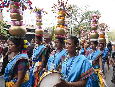 Members of the TMC women's wing participate in a rally to mark International Women's Day, in Kolkata, West Bengal.
