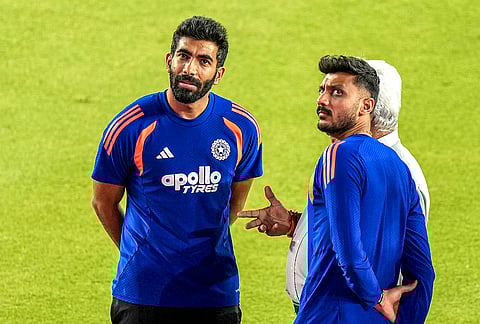 India's Jasprit Bumrah, left, and Axar Patel during a training session on the eve of the ICC Men's T20 World Cup 2026 final cricket match between India and New Zealand, at the Narendra Modi Stadium in Ahmedabad, Gujarat.