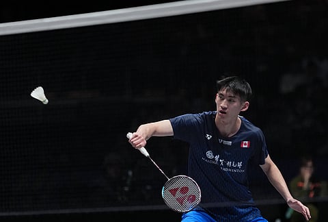 Canada's Victor Lai plays against India's Lakshya Sen during the men's singles semifinal match at the All England Open Badminton Championships in Birmingham, England.