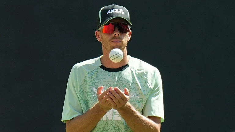 New Zealand's captain Mitchell Santner toss a ball during a practice session ahead of the T20 World Cup cricket final match against India in Ahmedabad, India, Saturday, March 7, 2026. - AP Photo/Ajit Solanki