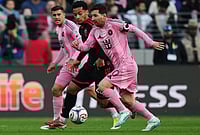 | Photo: AP/Stephanie Scarbrough : Inter Miami forward Lionel Messi (10) advances past D.C. United midfielder Brandon Servania, center, to score during the first half of an MLS soccer match in Baltimore.
