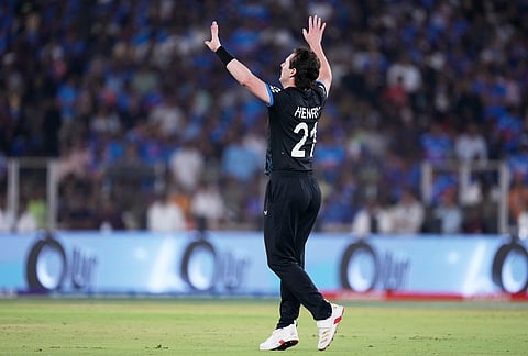 New Zealand's Matt Henry celebrates the wicket of India's Hardik Pandya during the T20 World Cup cricket final match between India and New Zealand in Ahmedabad.