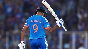 | Photo: AP/Ajit Solanki : India's Sanju Samson celebrates his fifty runs during the T20 World Cup cricket final match between India and New Zealand in Ahmedabad, India, Sunday, March 8, 2026.