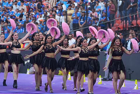 Dancers perform during the closing ceremony of the T20 World Cup cricket final match between India and New Zealand in Ahmedabad.
