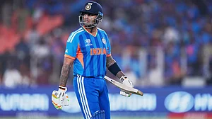 (AP Photo/Ajit Solanki) : India's captain Suryakumar Yadav leaves the ground after losing his wicket during the T20 World Cup cricket final match between India and New Zealand in Ahmedabad, India, Sunday, March 8, 2026