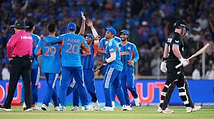 Ajit Solanki : India's players celebrate the wicket of New Zealand's Tim Seifert, right, during the T20 World Cup final in Ahmedabad.