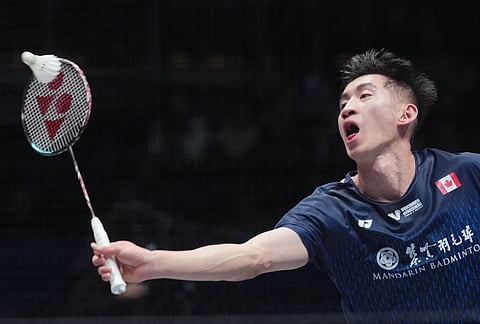 Canada's Victor Lai plays against India's Lakshya Sen during the men's singles semifinal match at the All England Open Badminton Championships in Birmingham, England.