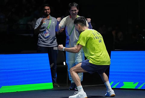 India's Lakshya Sen celebrates after winning the men's singles semifinal match against Canada's Victor Lai at the All England Open Badminton Championships in Birmingham, England.
