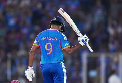 India's Sanju Samson celebrates his fifty runs during the T20 World Cup cricket final match between India and New Zealand in Ahmedabad.
