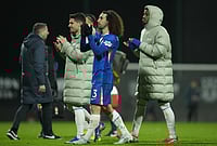 Wrexham 2-4 Chelsea, FA Cup: Blues Clinch Victory In Extra-Time | Photo: AP/Jon Super : Chelsea players walk off the pitch after the fifth round FA Cup soccer match between Wrexham and Chelsea in Wrexham, Wales.