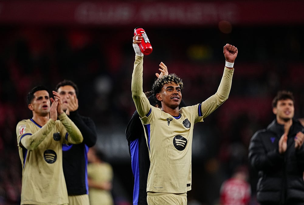 Barcelona's Lamine Yamal celebrates at the end of the Spanish La Liga soccer match between Athletic Bilbao and Barcelona in Bilbao, Spain. - | Photo: AP/Miguel Oses