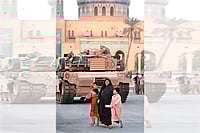 Whose Liberation Is It Anyway: The U.S. Intervention Playbook | Photo: Imago/AbcaPress : Lives, Disrupted: A US military tank next to a mosque in Baghdad in 2003