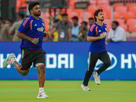 India's Sanju Samson, left, and Ishan Kishan during a training session on the eve of the ICC Men's T20 World Cup 2026 final cricket match between India and New Zealand, at the Narendra Modi Stadium in Ahmedabad, Gujarat.