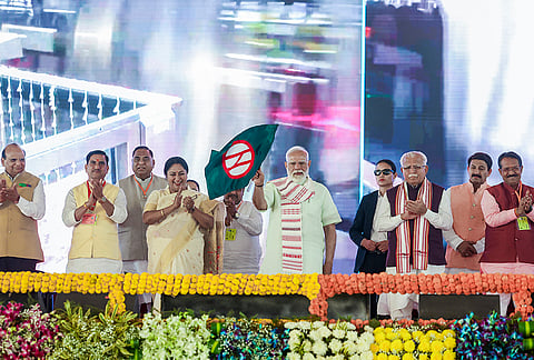 Prime Minister Narendra Modi with Union Minister of Housing and Urban Affairs Manohar Lal and Delhi CM Rekha Gupta during the inauguration and foundation stone laying ceremony of multiple development projects, New Delhi. 