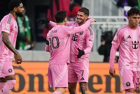 Inter Miami forward Lionel Messi (10) celebrates after his goal against D.C. United with midfielder Rodrigo de Paul (7) during the first half of an MLS soccer match, in Baltimore.