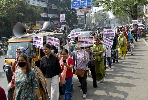 Nursing Ekta Manch Uttarakhand members stage a protest march towards the residence of state Chief Minister, demanding a year-wise recruitment policy, in Dehradun.