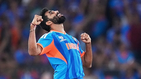 India's Jasprit Bumrah celebrates the wicket of New Zealand's Matt Henry during the T20 World Cup cricket final match between India and New Zealand in Ahmedabad, India, Sunday, March 8, 2026.