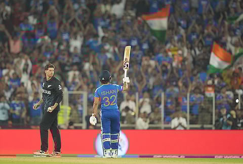 India's Ishan Kishan celebrates his fifty runs during the T20 World Cup cricket final match between India and New Zealand in Ahmedabad.
