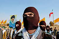 Islamic Revolutionary Guard Corps: Tehran’s Shadow Army Military Network: The Basij militia, affiliated to the IRGC, during a parade near Tehran